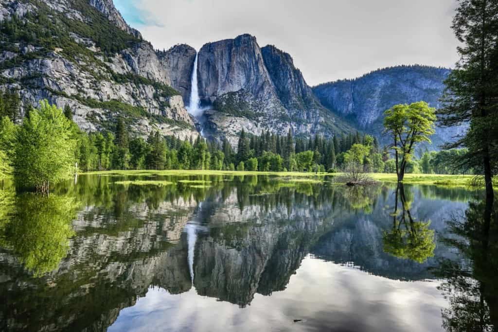 Yosemite falls with mirrored reflection in flooded valley