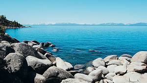 Lake Tahoe with rocky surroundings.