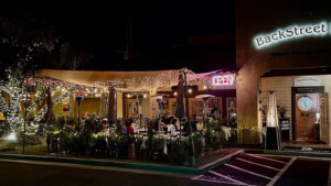 patio at Backstreet bistro at night with string lights