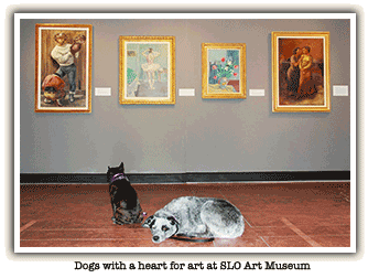 2 dogs in a museum