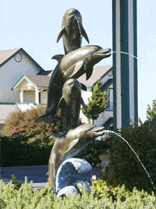 Dolphin sculpture/water fountain