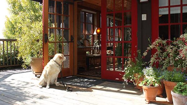 Kayla at the front door of the dog-passionate Stanford Inn