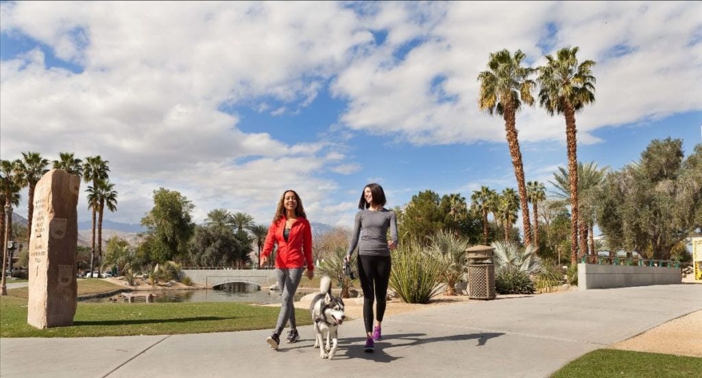 Taking a walk with a dog at the Cove Oasis Loop in La Quinta
