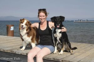 Two dogs and woman in Tahoe