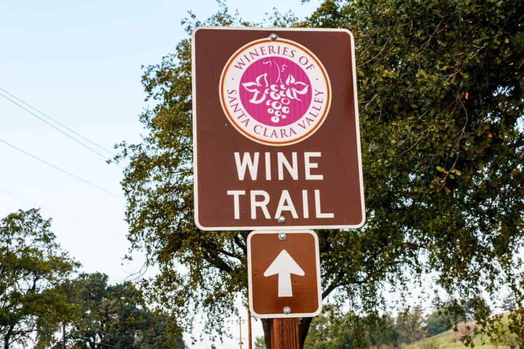 Street sign that reads "wineries of Santa Clara County Wine Trail"