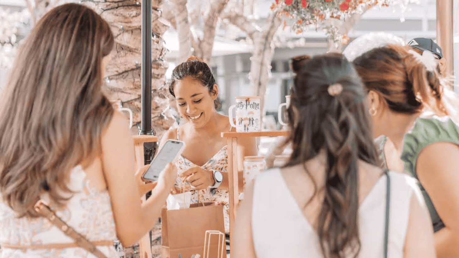 women shopping at an outdoor market