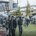 people shop at outdoor market