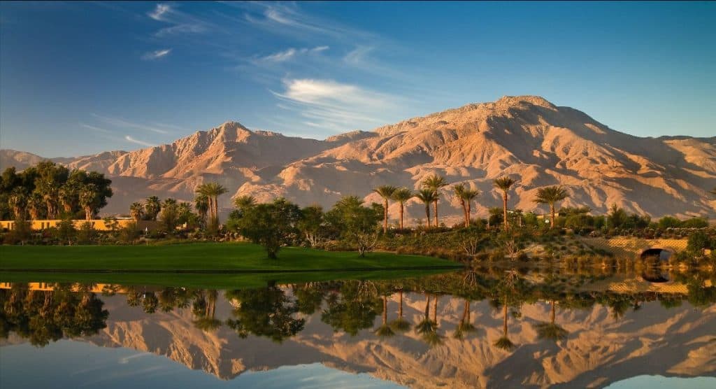 A golf course with mountains REFLECTED in the water is featured in our Newsletter archives. - Dogtrekker