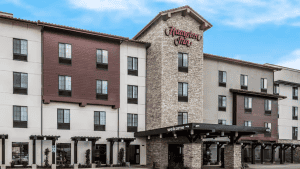 The Hampton Inn Concord with its towering multi-level structure.