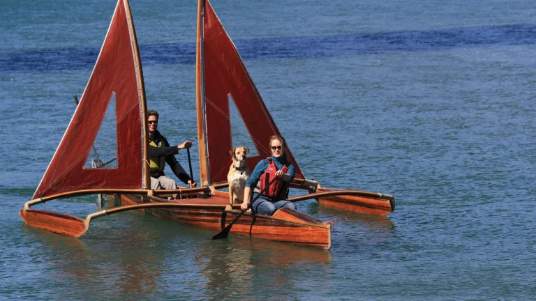 Dog-and-people-on-outrigger-canoe-story-1