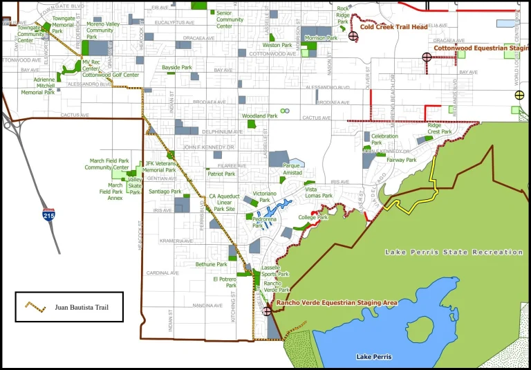 an urban trail starts at a large recreation area with a lake and moves northwest to a park
